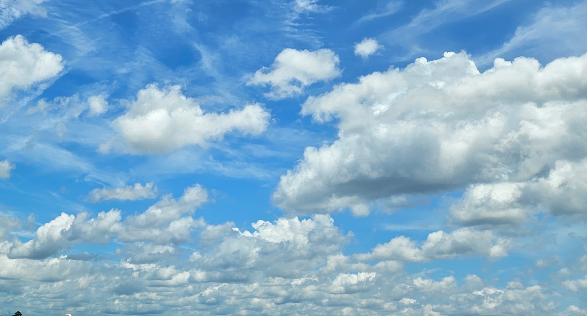 Blue Sky with scattered clouds